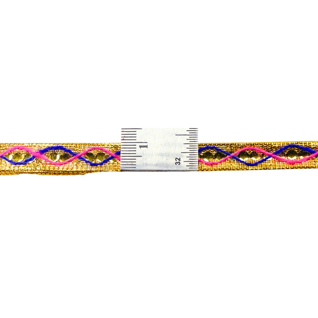 Gold ribbon with pink and blue wavy patterns on a white background